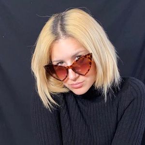 Cheetah Print Brown Frames Miss Kitty, cat eye shaped sunglasses .